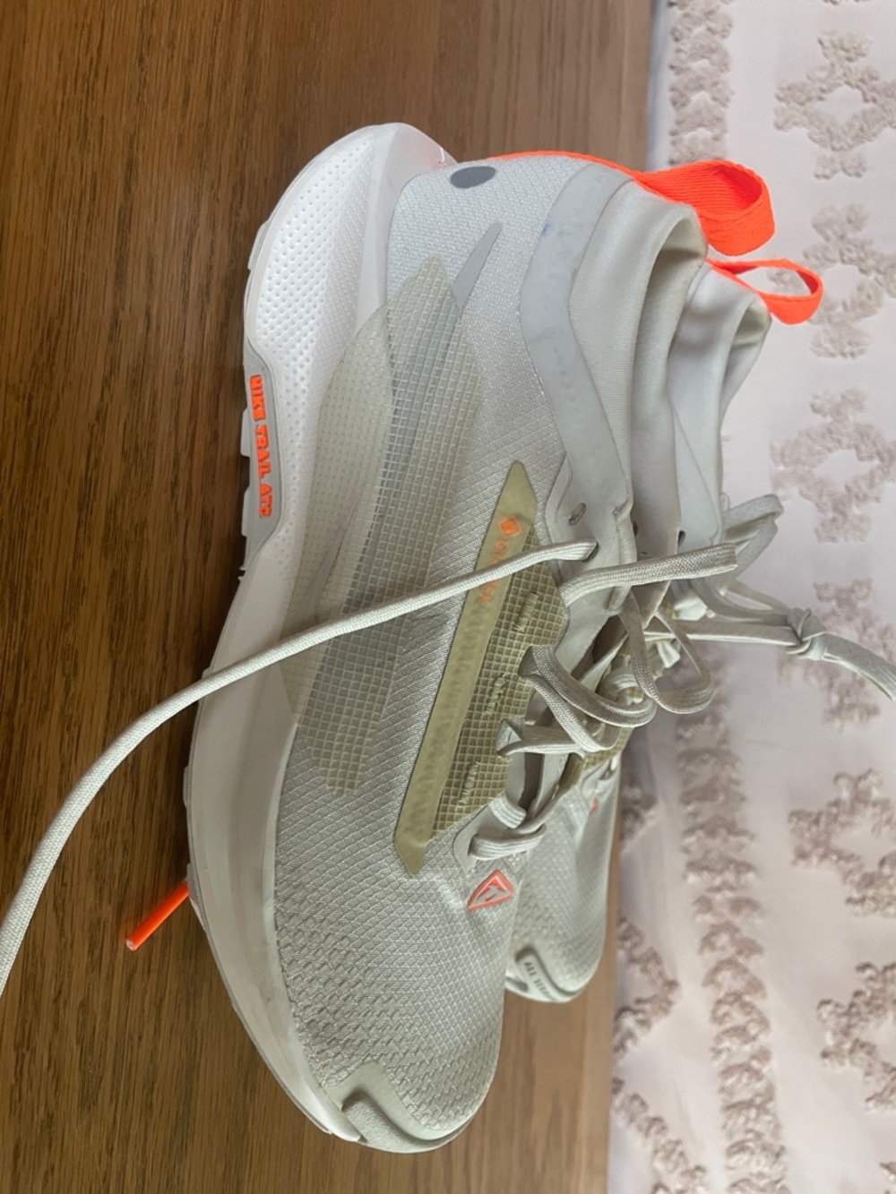 Nike White/Light Gray Running Sneakers with Neon Orange Accents